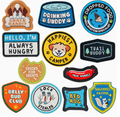 Collection of colorful dog-themed patches on a white background